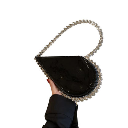 High-grade Diamond-embedded Niche Love Handbag in white, gold, red, black, silver, and pink, heart-shaped PU bag with diamond embellishments.