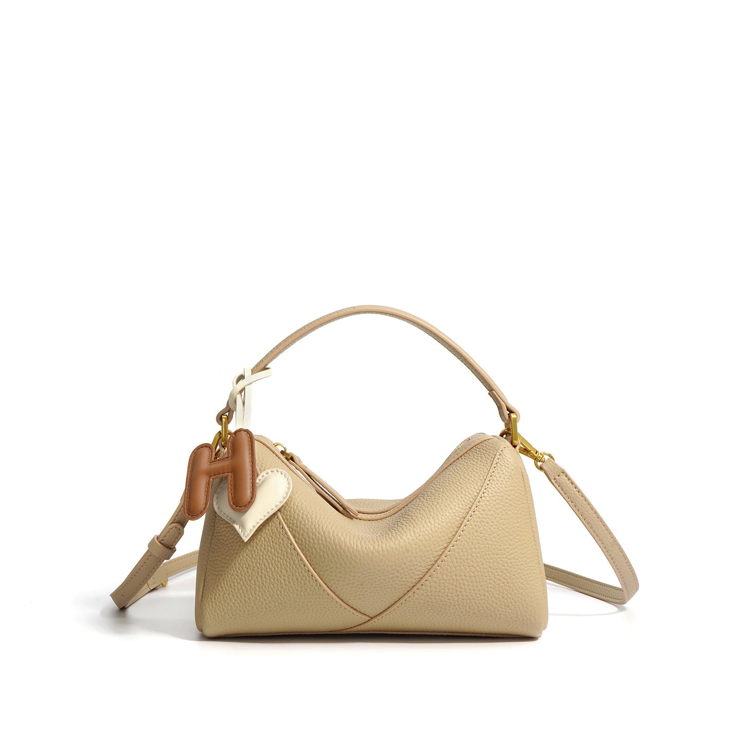 Elegant textured cowhide shoulder bag, made from soft genuine leather, perfect for a chic and refined look