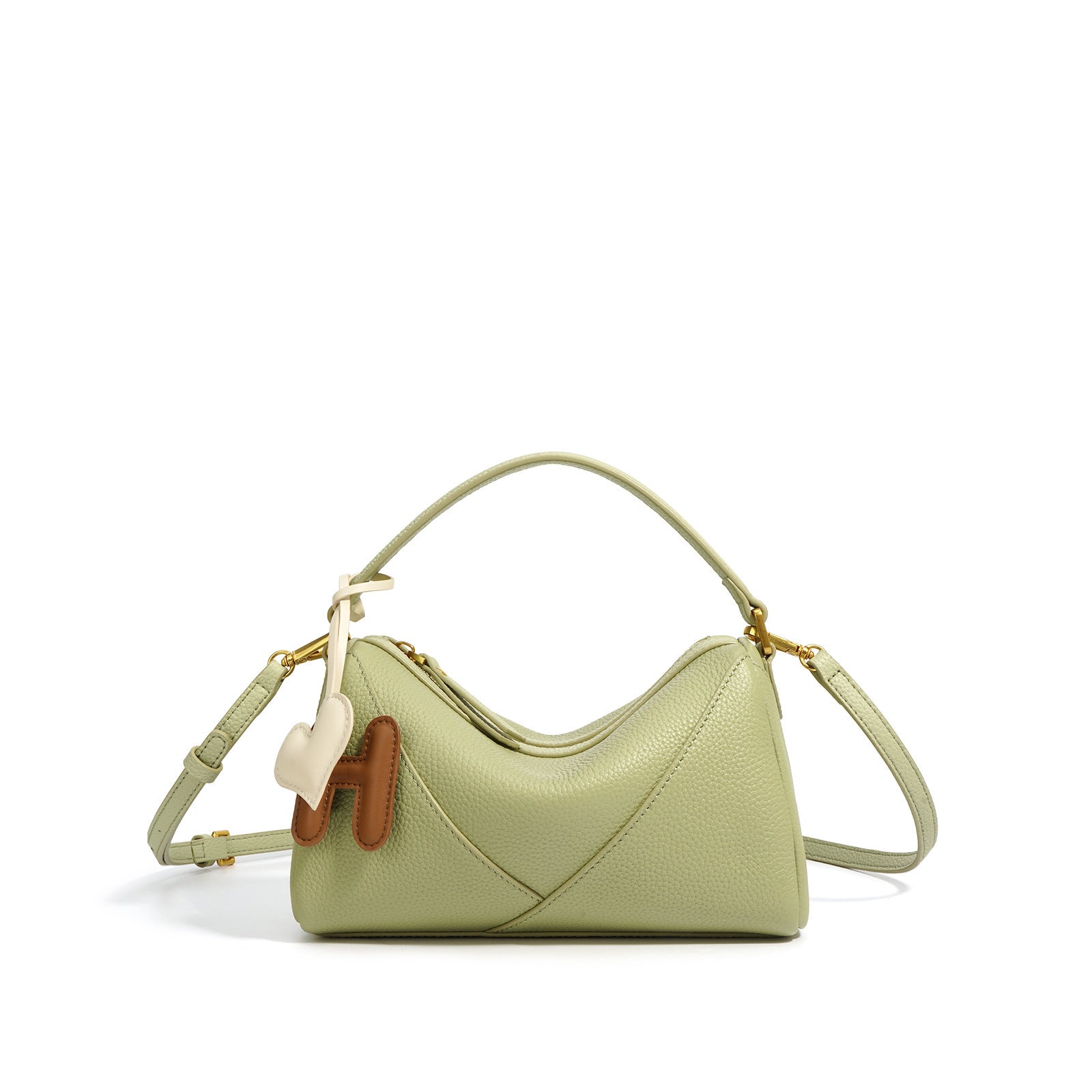 Elegant textured cowhide shoulder bag, made from soft genuine leather, perfect for a chic and refined look