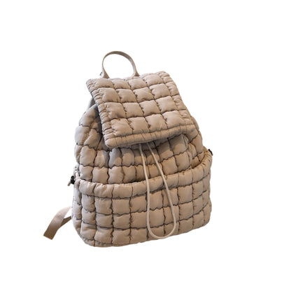 The Candy Color Quilted Women Backpack is a trendy and lightweight puffer bag made of soft nylon with padded shoulder straps. With multiple pockets and a drawstring flap closure, it’s ideal for work, college, and travel, combining style and functionality.