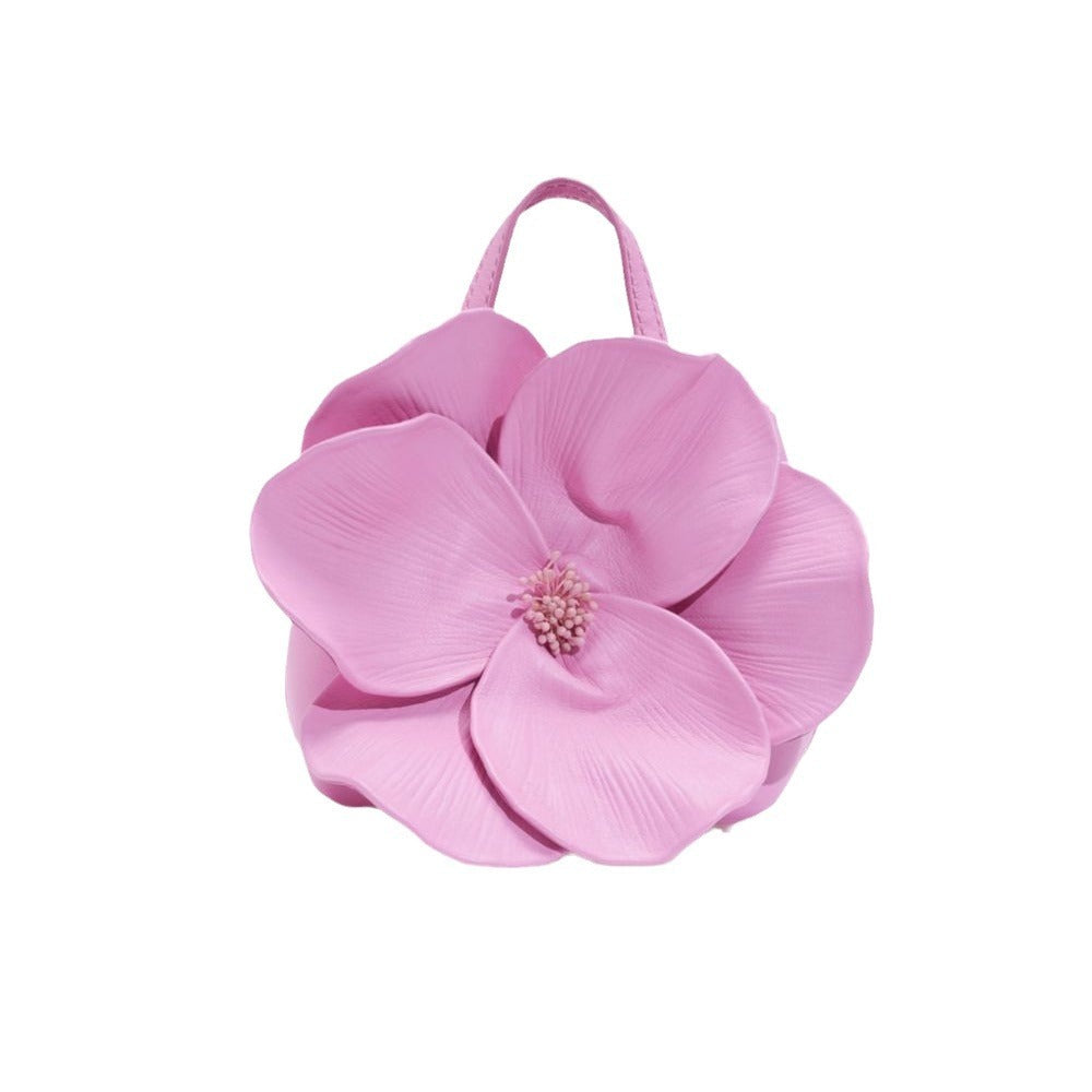 The French Style Petal Flower Tote Bag is a chic and versatile accessory for any occasion. Made from durable PU leather with floral and chain accents, it offers a balance of style and practicality for daily use.

