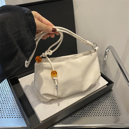 Solid color white shoulder bag, stylish and practical single-shoulder design for everyday use.